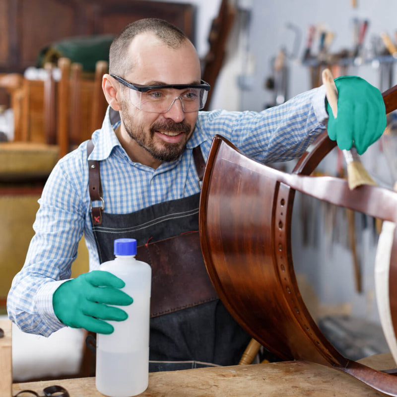 Ansell TouchNTuff 92-600 Powder Free Green Nitrile Disposable Gloves | Green Nitrile Gloves being used by a carpenter in a workshop | www.theglovestore.co.uk